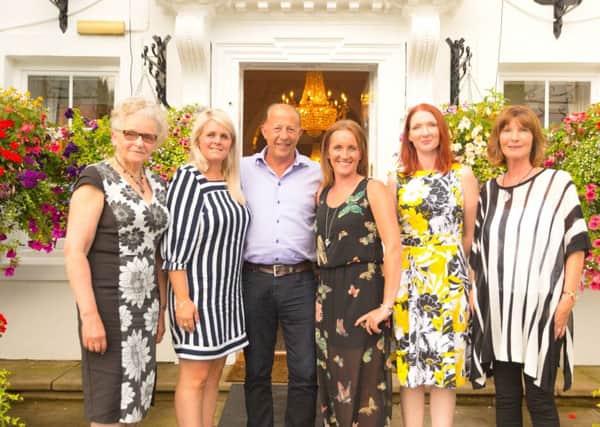 From Left to right - Sheila Lemon, Claire Friend, Bob Parker(Forever's country manager), Rachel Forshaw, Clare Deavall and Lis George outiide Longbrige Manor, Forever UK's head office in Warwick.