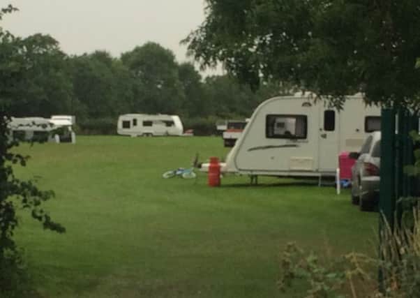 Travellers on the Southam College playing fields