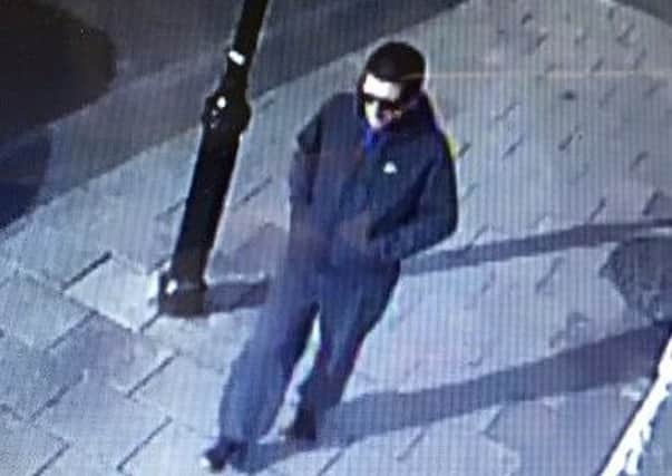 Police would like to speak to this man in connection with the robbery