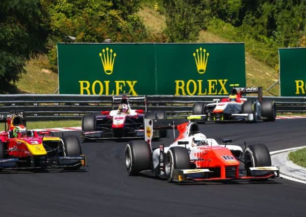Jordan King in the thick of the battle at the Hungaroring.