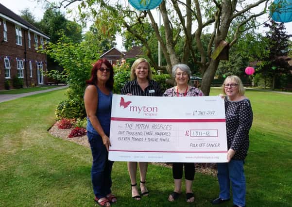 Cheque presentation to Myton Hospice from the money raised at Folk Off Cancer.
