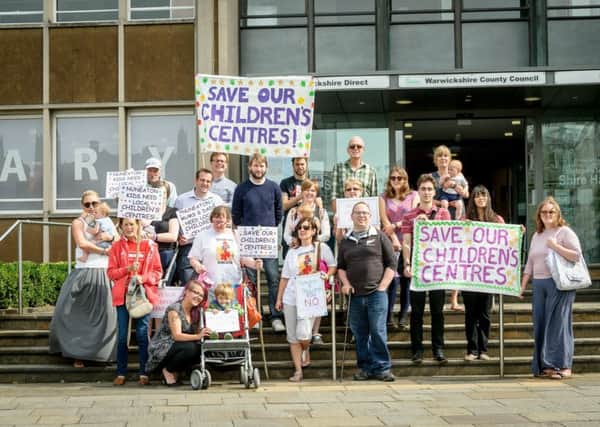 Photo of a recent protest in Warwick about the proposed cuts to children's centres in Warwickshire.
