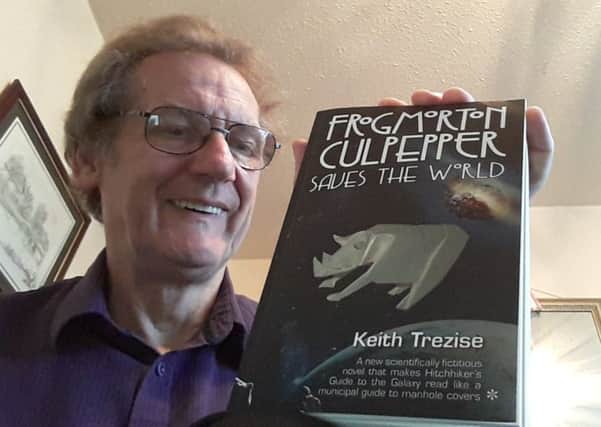 Keith Trezise with his book.