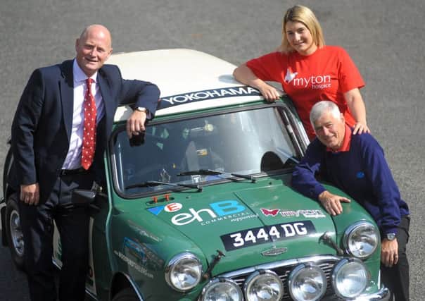 ehB Commercial director Simon Hain (left) with The Myton Hospices corporate fundraiser Abigail Smith and rally driver Les Allfrey.