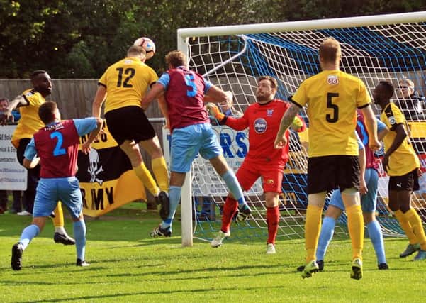 Colby Bishops heads home Brakes' opener. Pictures: Sally Ellis