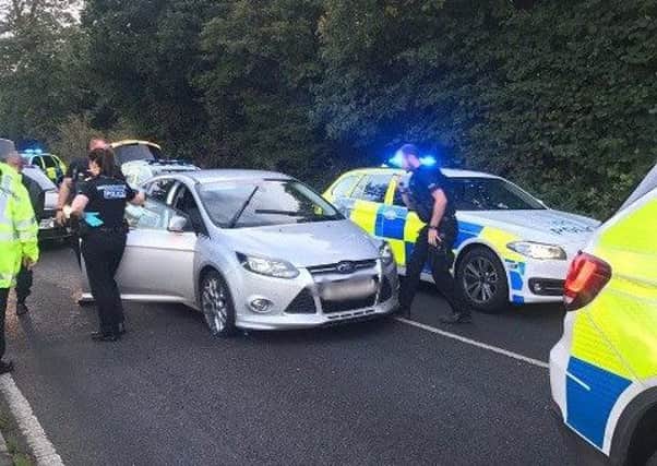 The car stopped in Barford after police used a stinger device. Photo by Warwickshire Police.