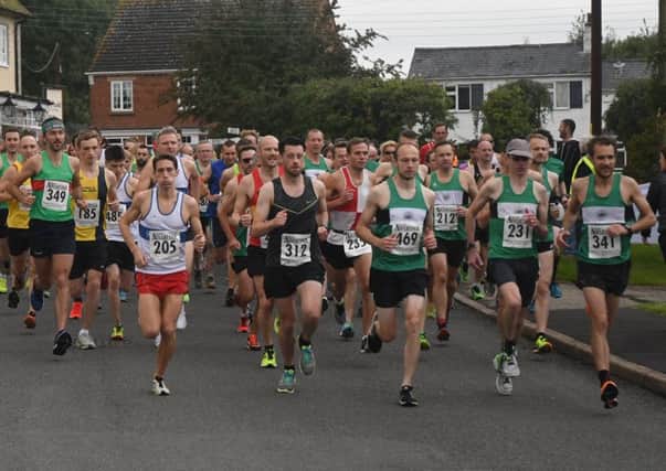 Runners head off at the start of the Rugby 10 with eventual winner Paul Andrew (205) to the fore. Picture: Bryan Acford