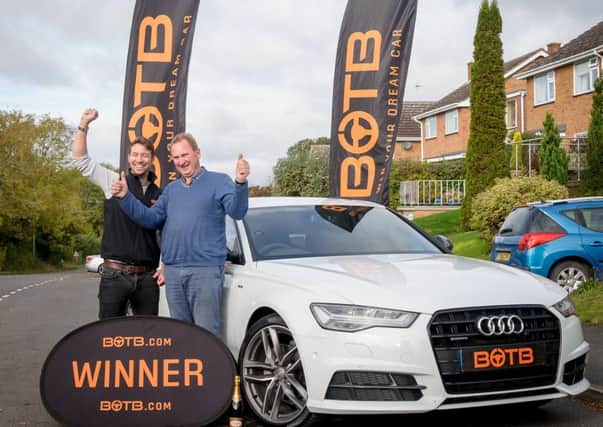 Raymond Flanigan was presented with the new Audi A6 All Round 3.0, by Christian Williams TV & Radio Presenter and representative for BOTB (Best of the Best). Raymond won the car after entering a competition at Birmingham Airport recently. NNL-171010-193221009