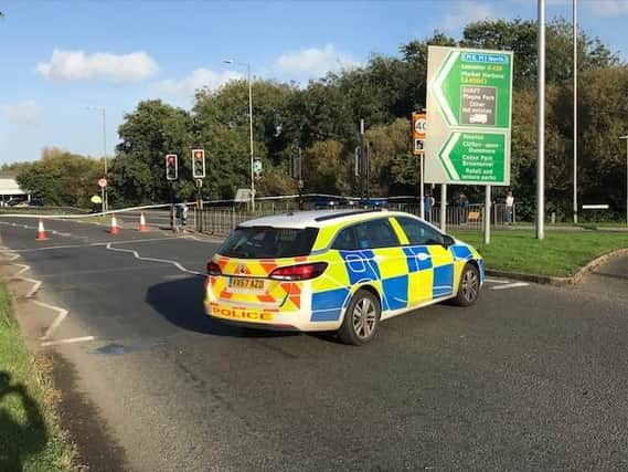 Police at the Avon Mill roundabout, looking north on Leicester Road. Credit: Tom Buxton.