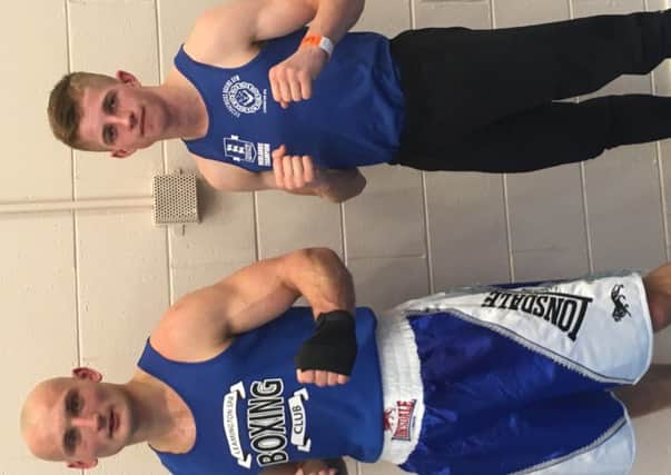 Royal Leamington Spa ABC's Mario Piwowar with Fitzpatrick's boxer Nick Leahy.