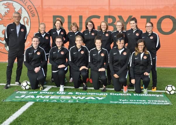 Rugby Town Ladies in their new tracksuits, sponsored by Jamesway Travel