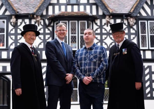Former Guardsman John Dawson with solicitor Nick Watts and Lord Leycester HospitalÂ Brethren John Wilcock (left) and John Maughan (right).