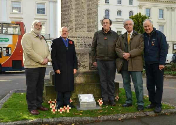 Alan Griffin (left), Barry Franklin (centre right), Richard King (second from right) and Allan Jennings (right) of the Leamington History Group are pictured handing over ownership of the civilian memorial plaque to Leamington Town Council represented by Leamington Mayor's consort John Evetts. Picture by Allan Jennings.